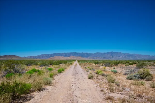 a view of lake and mountain