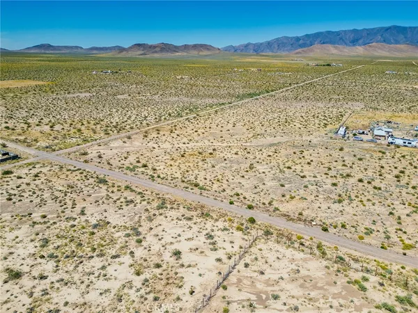 a view of an ocean and a mountain