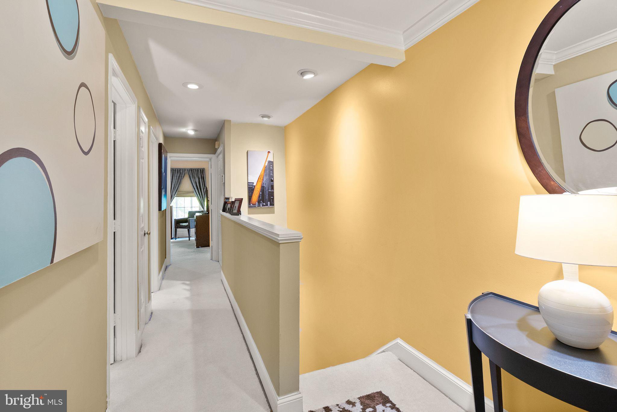 3267 Sutton Place Northwest, Unit C Washington, DC 20016 - Photo 10 of 21 a view of a hallway with furniture