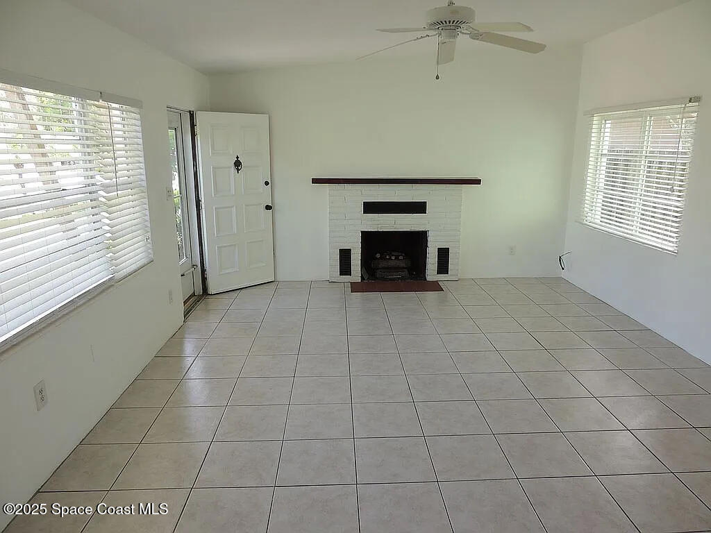206 4th Avenue Indialantic, FL 32903 - Photo 19 of 43 an empty room with windows
