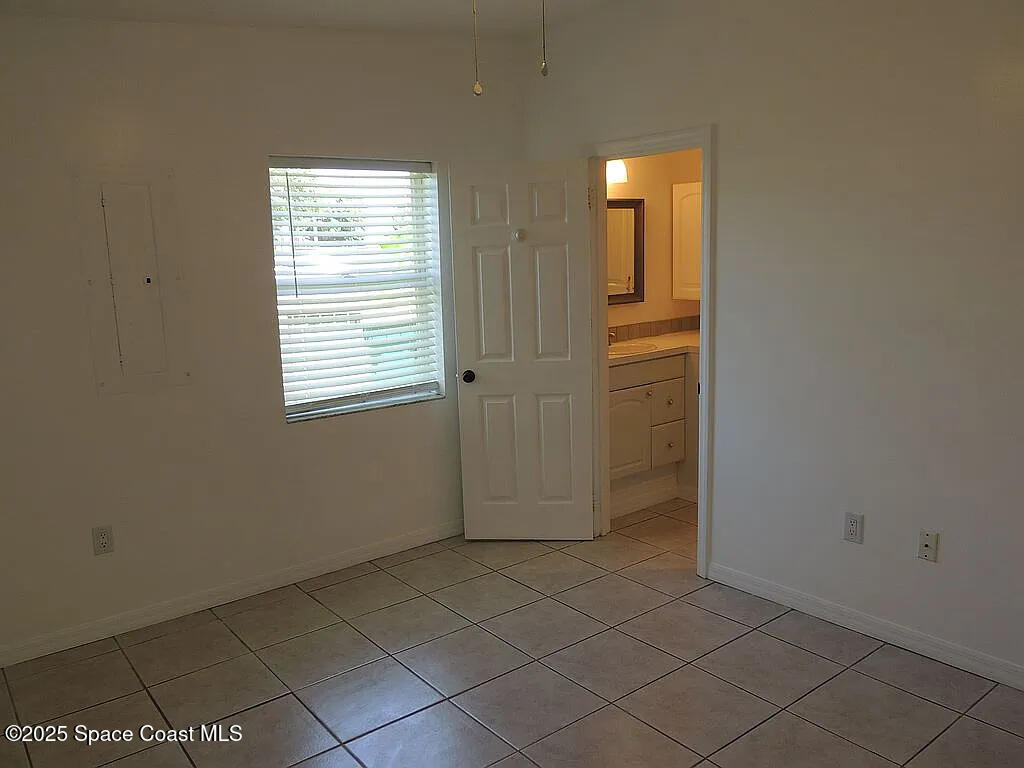 206 4th Avenue Indialantic, FL 32903 - Photo 26 of 43 an empty room with windows