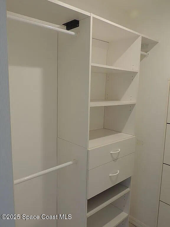 206 4th Avenue Indialantic, FL 32903 - Photo 27 of 43 a view of an empty walk in closet