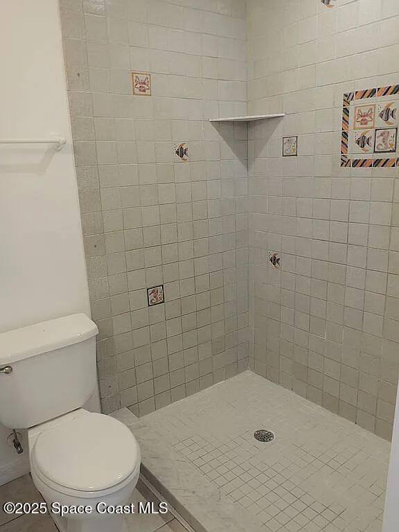 206 4th Avenue Indialantic, FL 32903 - Photo 32 of 43 a bathroom with a toilet and a shower