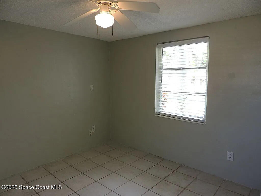 206 4th Avenue Indialantic, FL 32903 - Photo 41 of 43 an empty room with a window