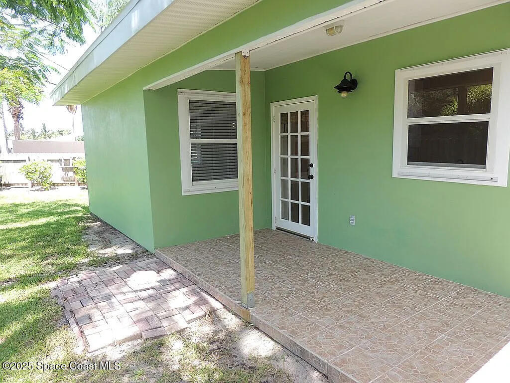 206 4th Avenue Indialantic, FL 32903 - Photo 10 of 43 a view of an front door