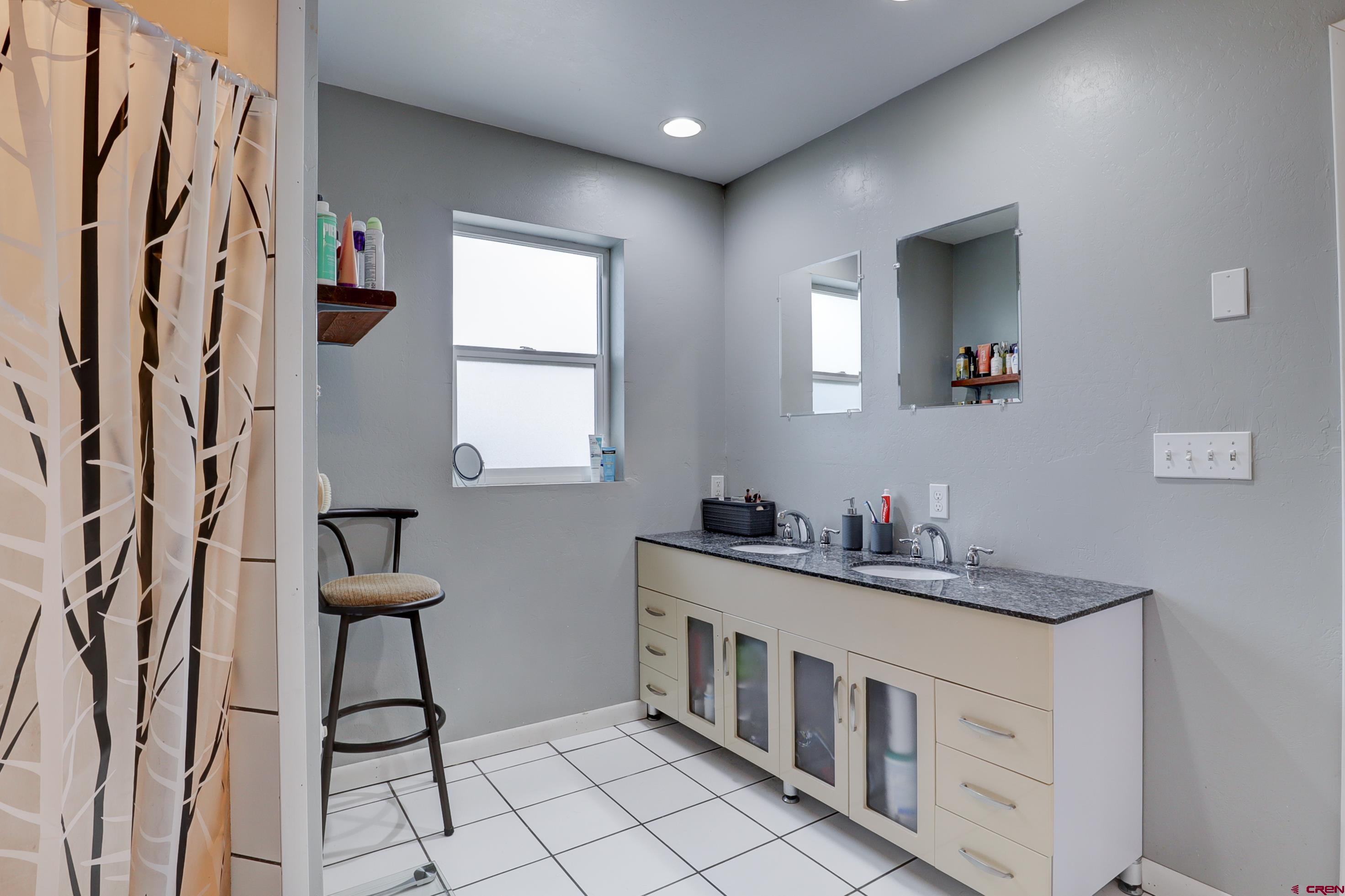 2019 Rolling Road Cortez, CO 81321 - Photo 23 of 35 a kitchen with stainless steel appliances a sink and a refrigerator