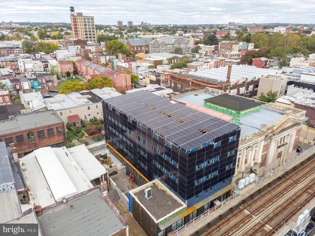 a view of a balcony with city view