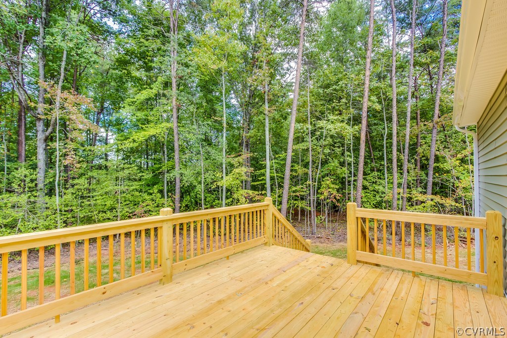 3762 County Line Road Kents Store, VA 23084 - Photo 16 of 17 a view of a wooden chairs and iron fence