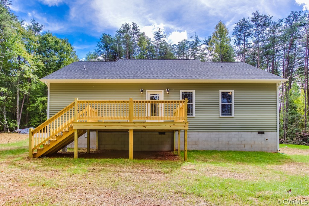 3762 County Line Road Kents Store, VA 23084 - Photo 17 of 17 a view of a house with a backyard