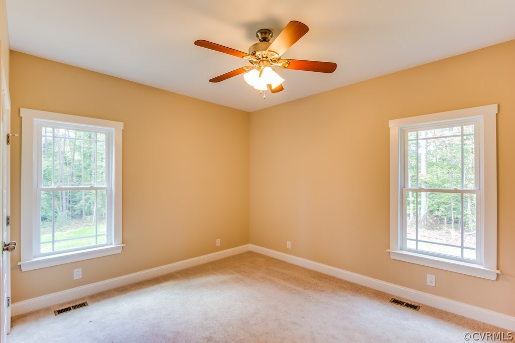 3762 County Line Road Kents Store, VA 23084 - Photo 8 of 17 a view of an empty room with a window