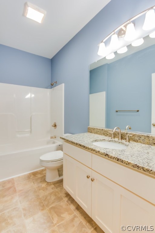 3762 County Line Road Kents Store, VA 23084 - Photo 10 of 17 a bathroom with a granite countertop sink a toilet and bathtub