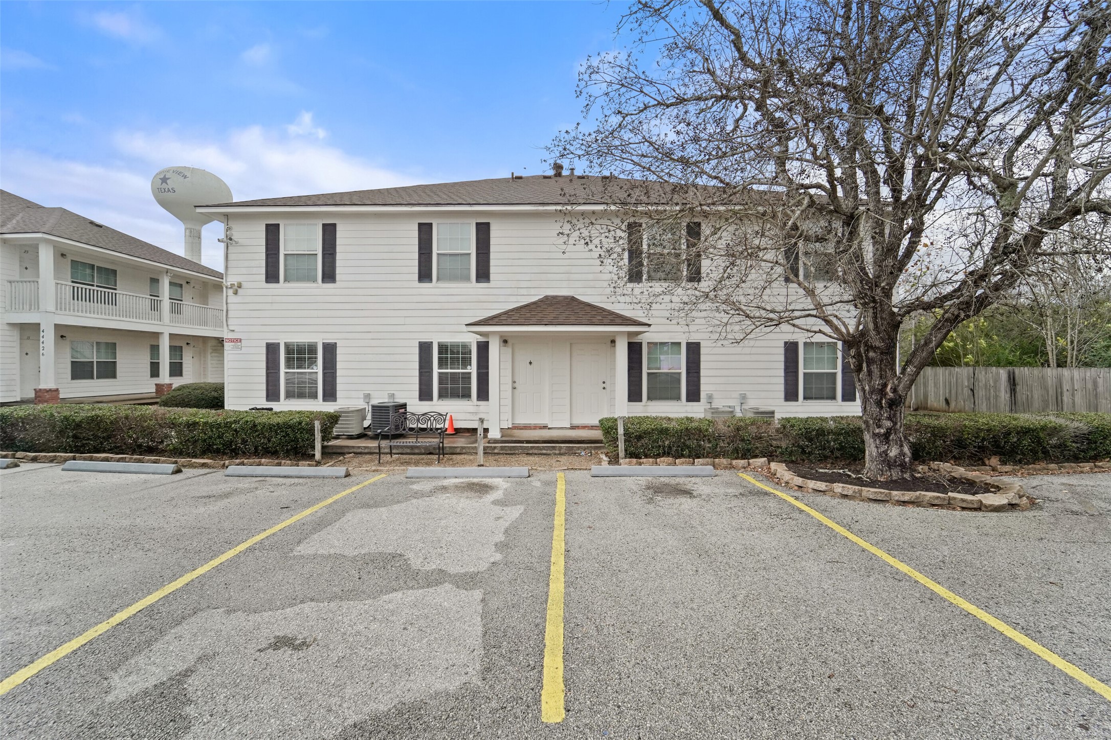 44422 Highway 290 Business, Unit 12 Prairie View, TX 77484 - Photo 2 of 13 a view of a house with a patio