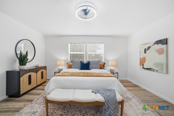 3267 Dairy Road Temple, TX 76501 - Photo 21 of 42 a bedroom with a bed and a window