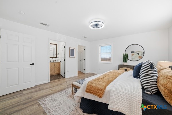 3267 Dairy Road Temple, TX 76501 - Photo 22 of 42 a bedroom with a bed and a table