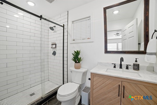 3267 Dairy Road Temple, TX 76501 - Photo 29 of 42 a bathroom with a sink a toilet and shower