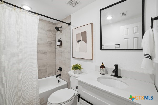 3267 Dairy Road Temple, TX 76501 - Photo 30 of 42 a bathroom with a sink a toilet and shower