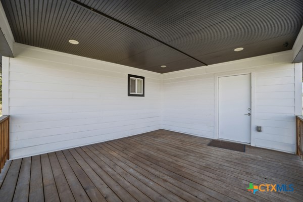 3267 Dairy Road Temple, TX 76501 - Photo 33 of 42 a view of an empty room with wooden floor