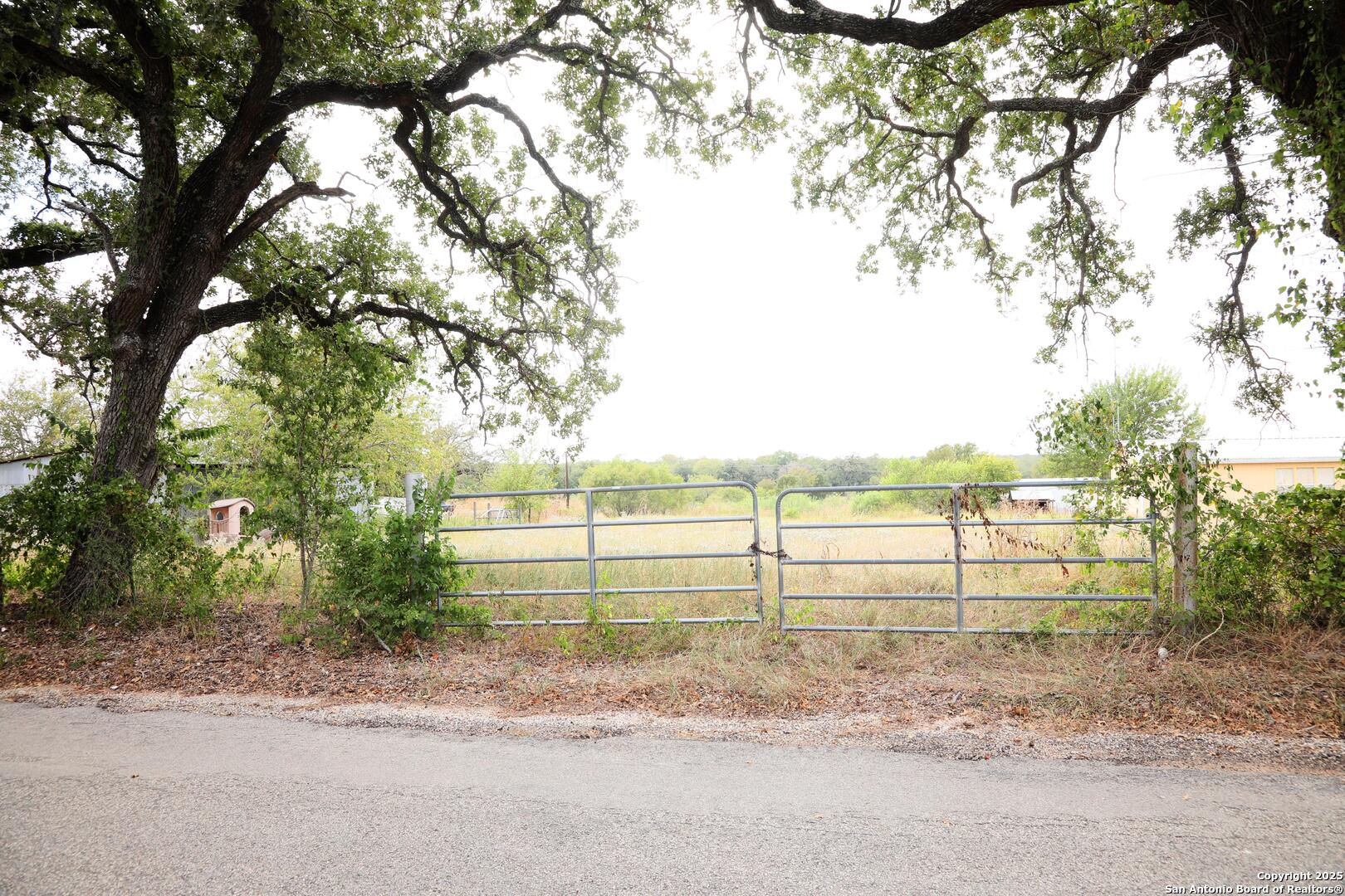 0 Sandy Creek Road Dale, TX 78616 - Photo 2 of 4 a view of a backyard of the house
