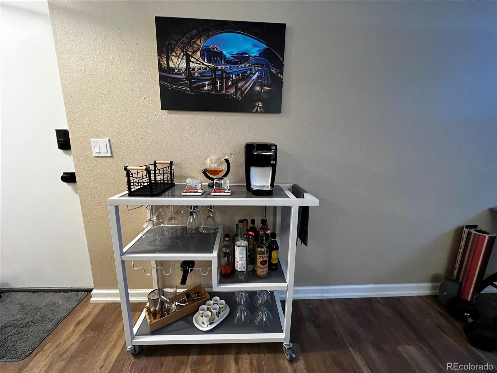 1260 North Humboldt Street, Unit 3 Denver, CO 80218 - Photo 5 of 6 a living room with furniture and wooden floor
