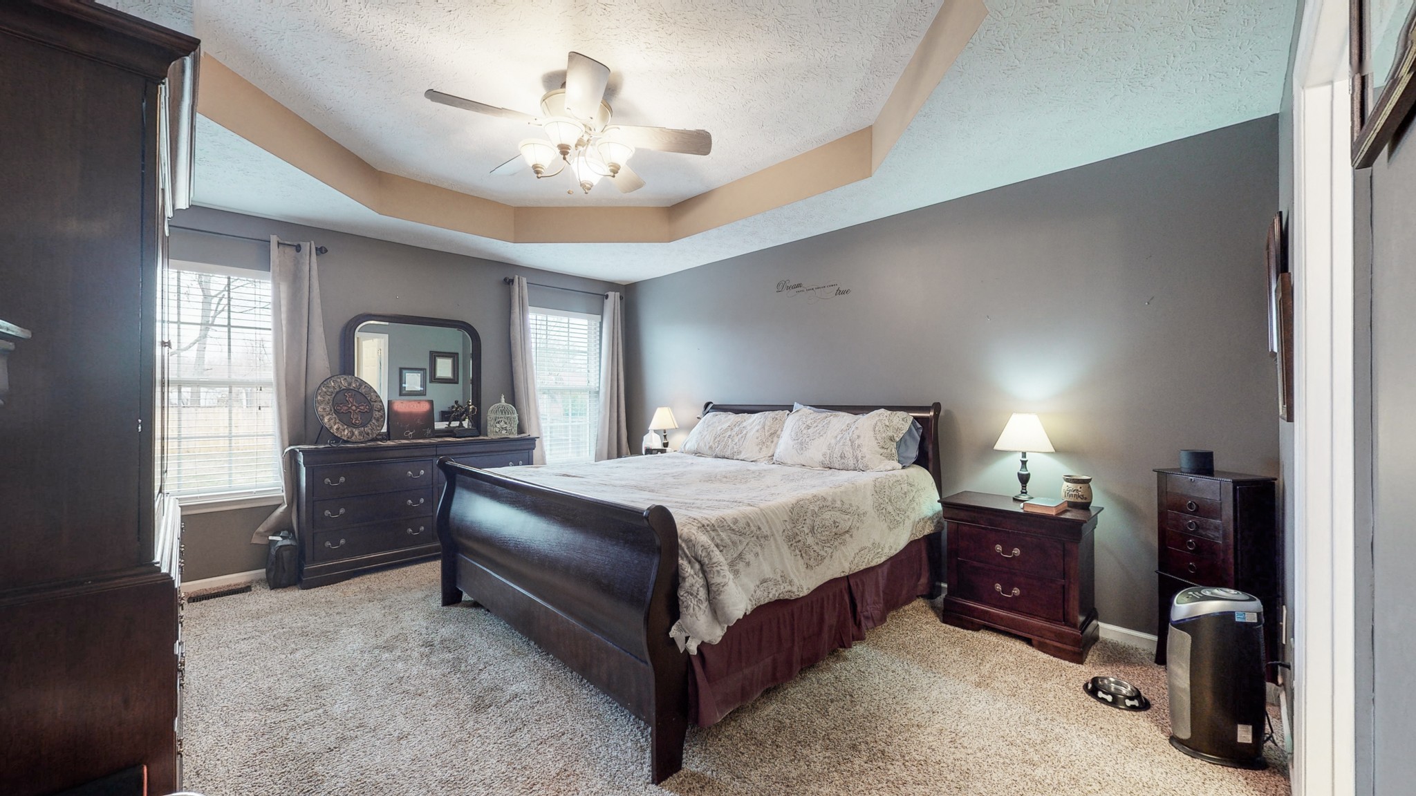 1503 Whitmore Street Lebanon, TN 37087 - Photo 14 of 32 a bedroom with a bed and a chandelier