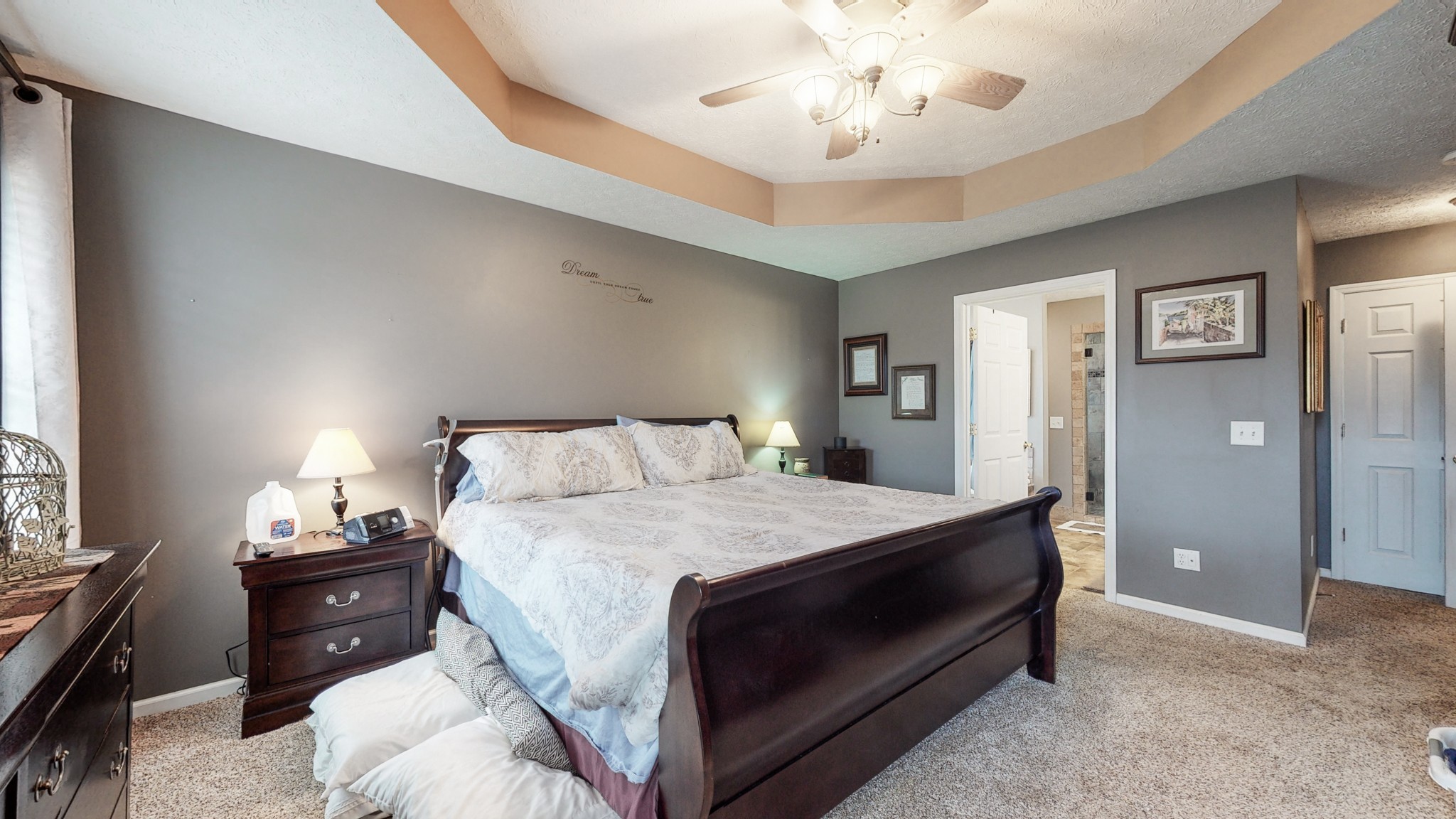 1503 Whitmore Street Lebanon, TN 37087 - Photo 15 of 32 a bedroom with a bed and a chandelier