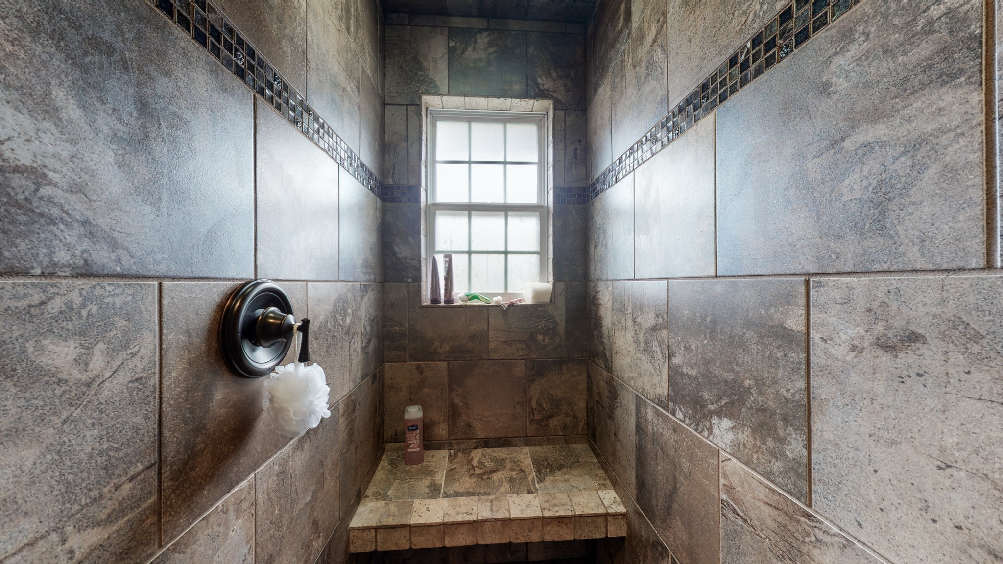 1503 Whitmore Street Lebanon, TN 37087 - Photo 19 of 32 a bathroom with a granite countertop shower a toilet and a sink