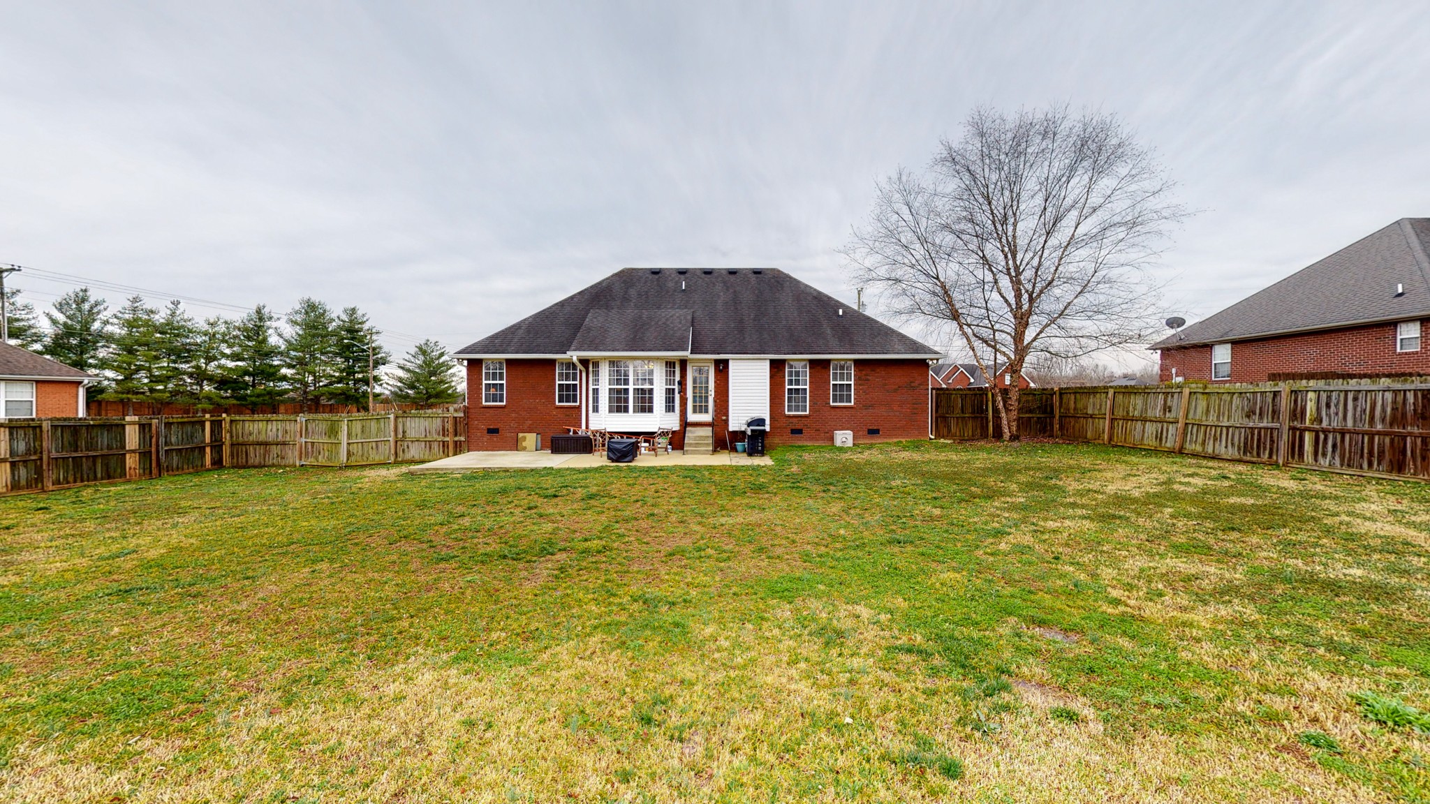 1503 Whitmore Street Lebanon, TN 37087 - Photo 28 of 32 a view of a house with a yard table and chairs