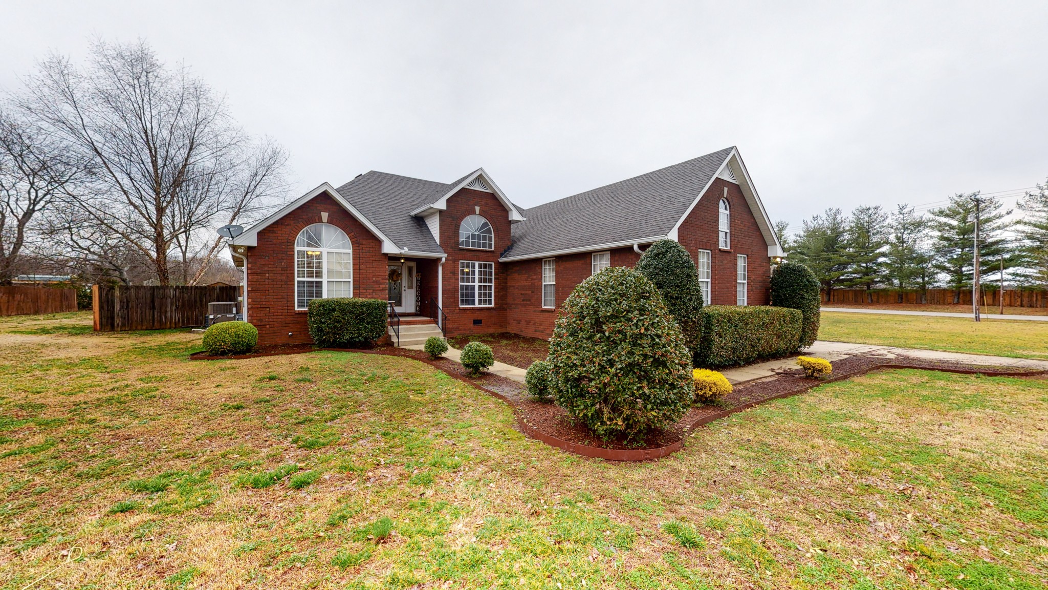 1503 Whitmore Street Lebanon, TN 37087 - Photo 31 of 32 a front view of a house with a yard and garage