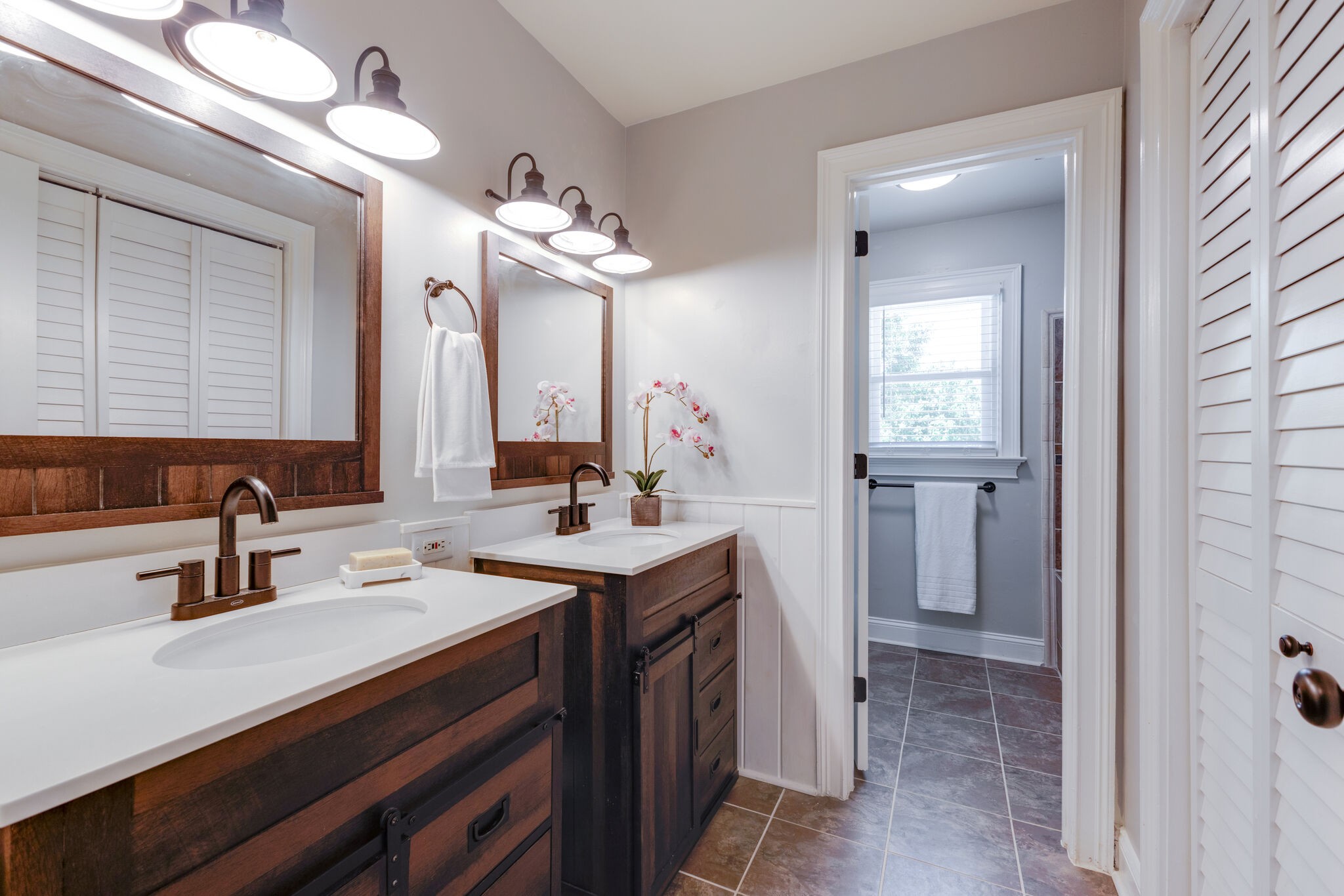 6179 Pettus Road Antioch, TN 37013 - Photo 40 of 57 Hall bath with double vanities and large linen closet. Tile flooring.