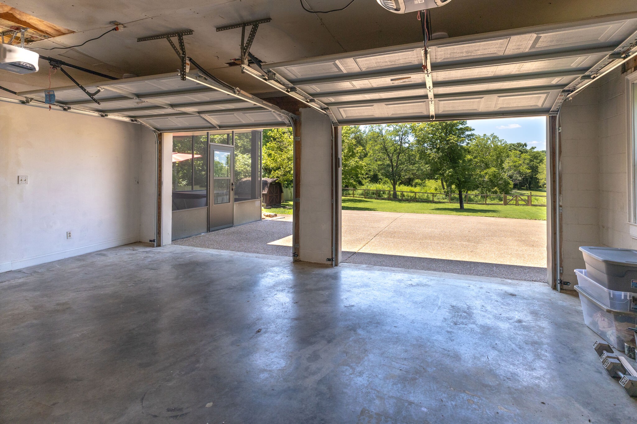 6179 Pettus Road Antioch, TN 37013 - Photo 47 of 57 Look at the view from the garage! Plenty of aggregate parking. Lower sunroom. New, quiet garage door openers and a keypad for entry. So nice!