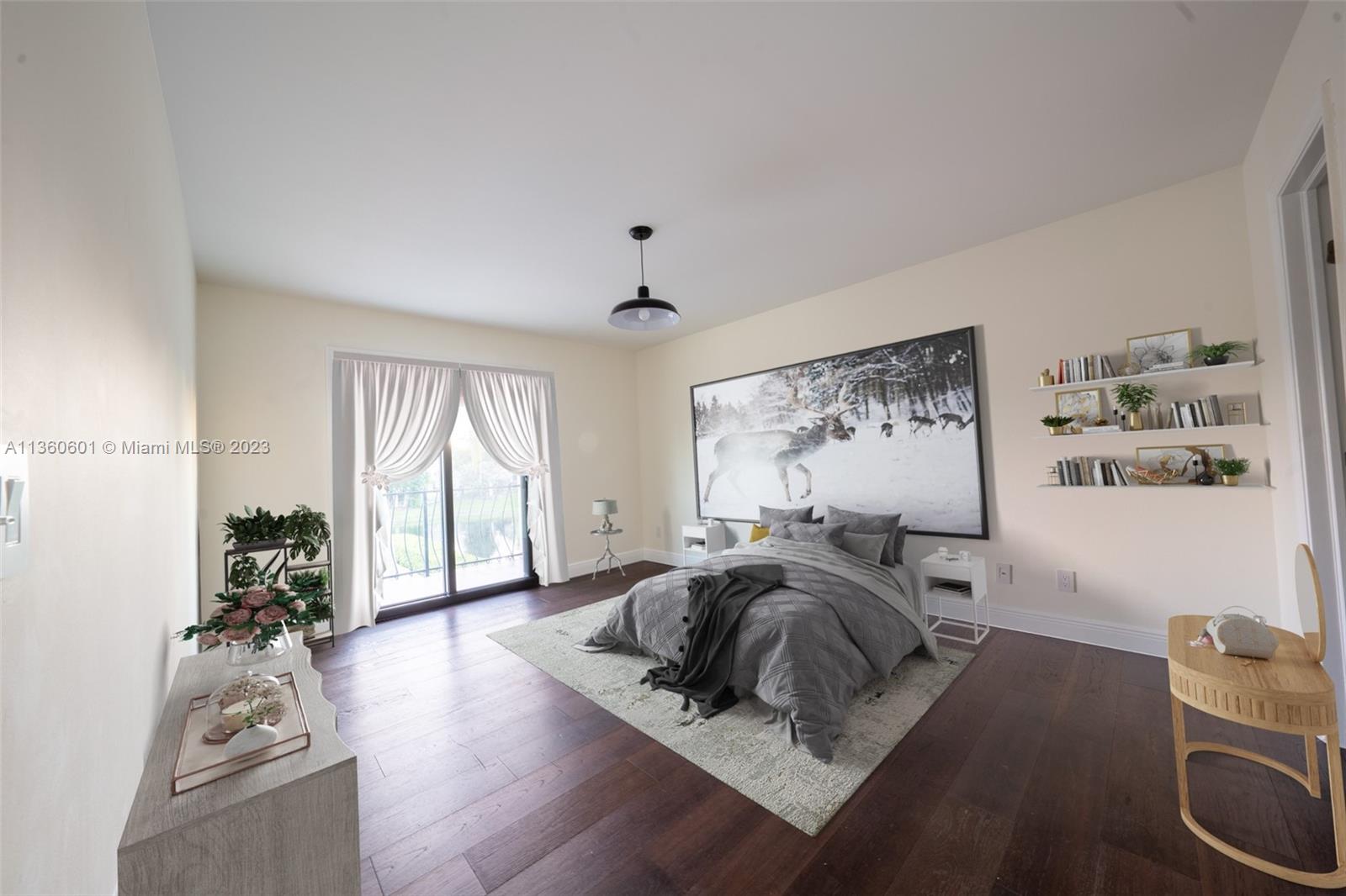 23299 Mirabella Circle North Boca Raton, FL 33433 - Photo 12 of 30 a spacious bedroom with a bed and wooden floor