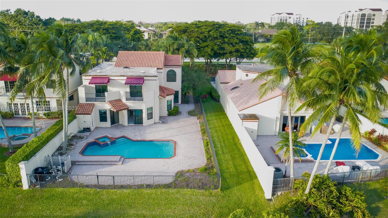23299 Mirabella Circle North Boca Raton, FL 33433 - Photo 13 of 30 an aerial view of residential houses with outdoor space and trees