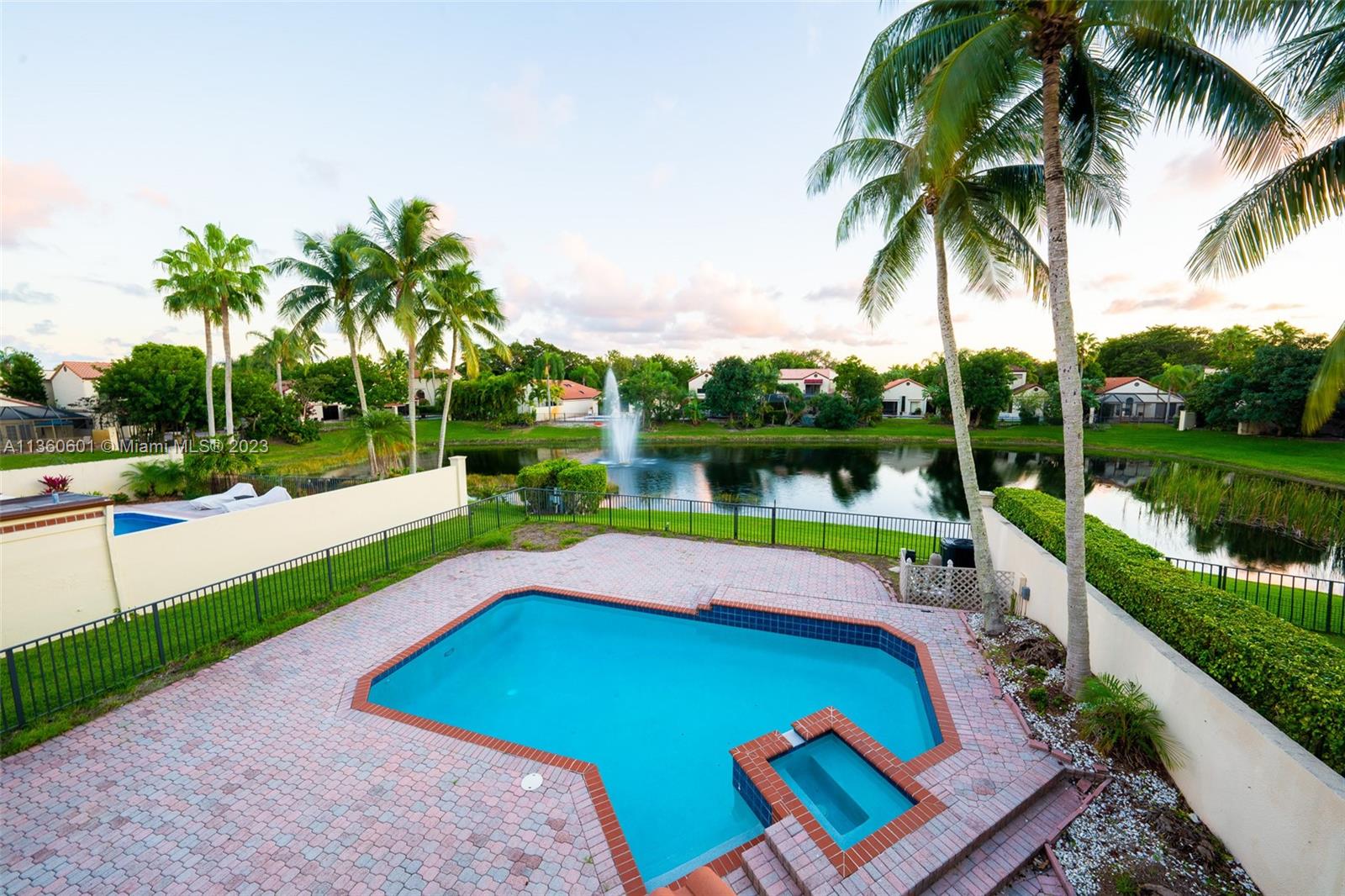 23299 Mirabella Circle North Boca Raton, FL 33433 - Photo 17 of 30 a view of an outdoor space and swimming pool