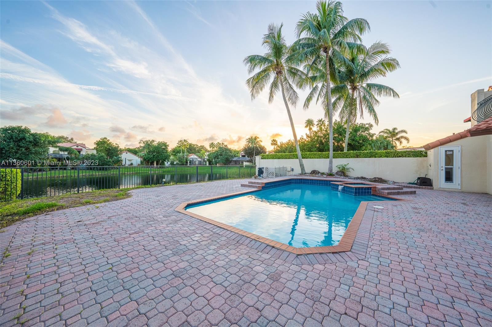 23299 Mirabella Circle North Boca Raton, FL 33433 - Photo 19 of 30 a view of a swimming pool with a yard