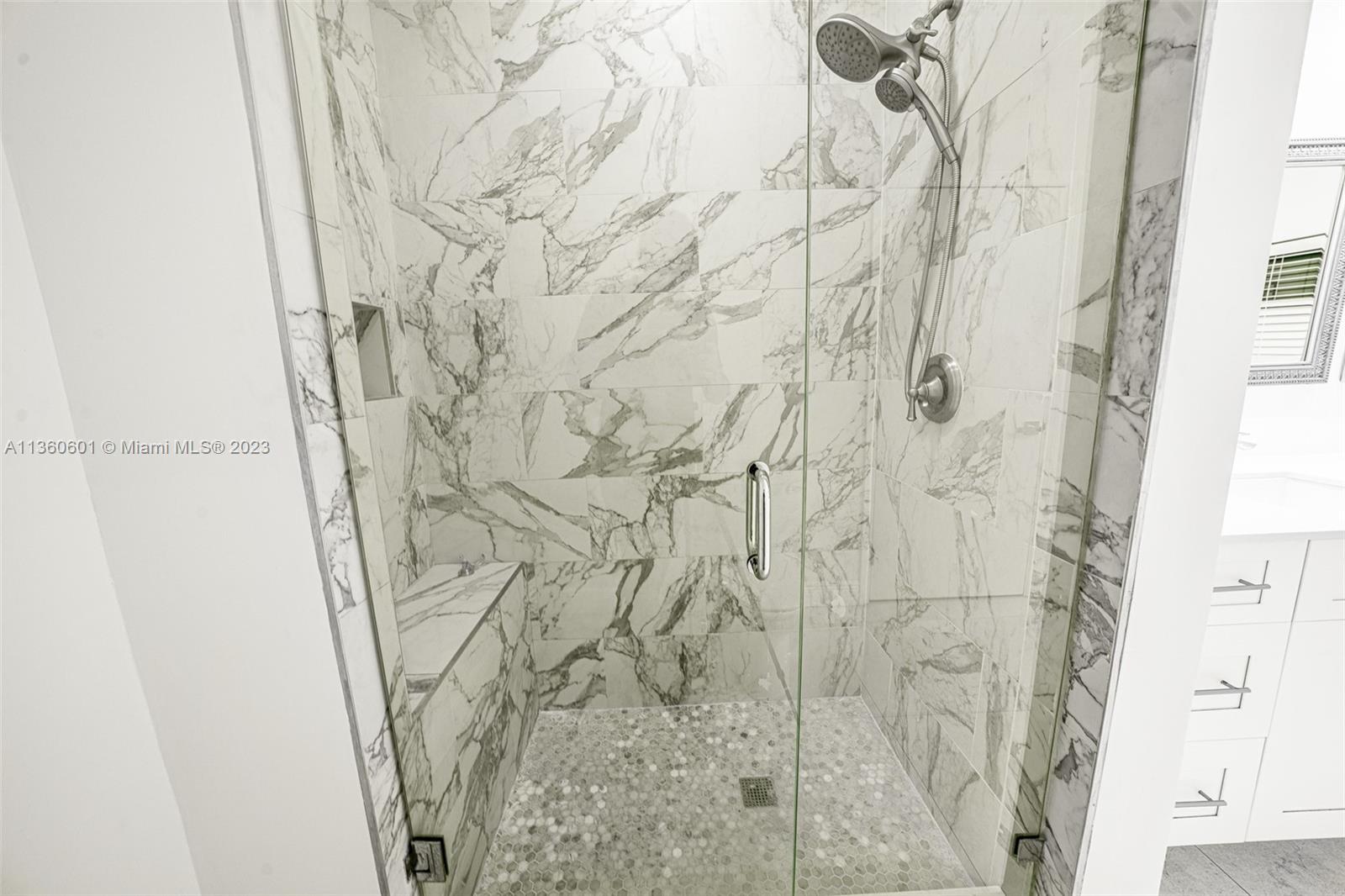 23299 Mirabella Circle North Boca Raton, FL 33433 - Photo 25 of 30 a bathroom with a shower