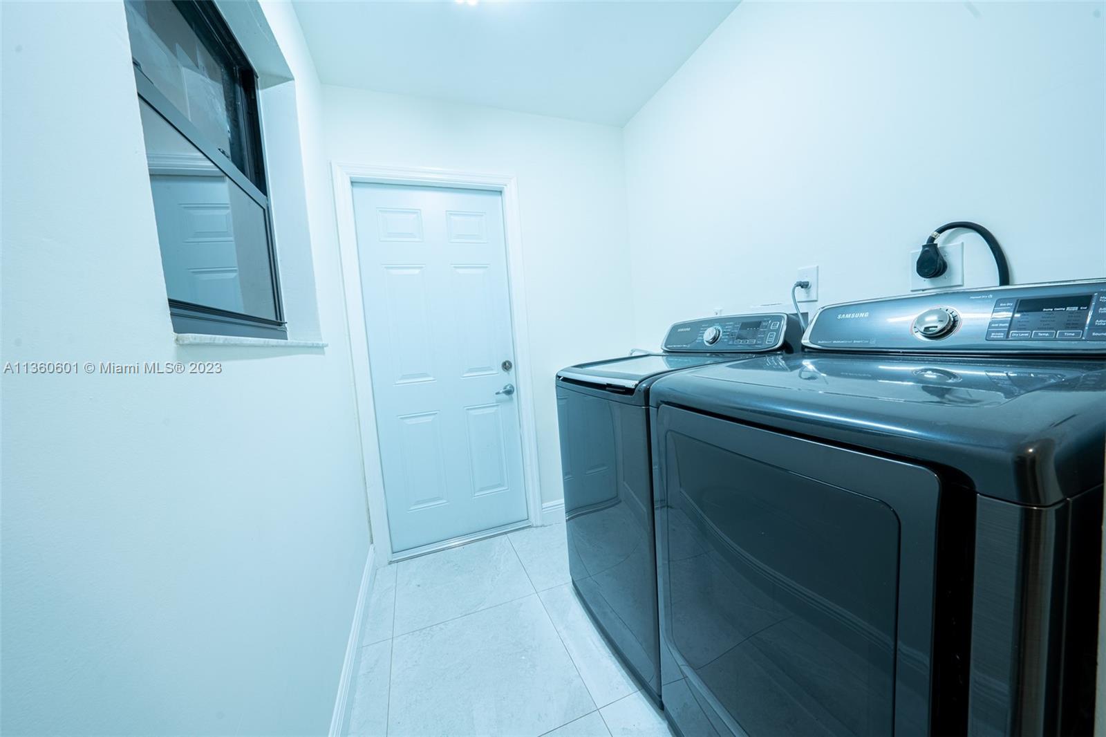 23299 Mirabella Circle North Boca Raton, FL 33433 - Photo 30 of 30 a bathroom with a granite countertop sink and a mirror