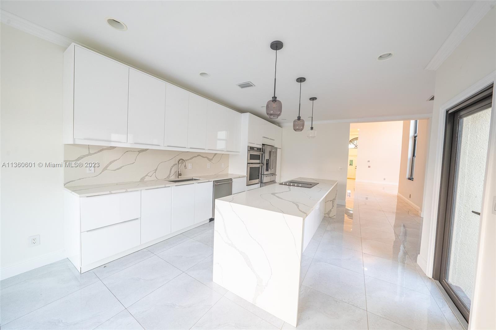 23299 Mirabella Circle North Boca Raton, FL 33433 - Photo 9 of 30 a utility room with dryer and washer