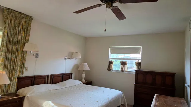 a bedroom with a bed and a closet