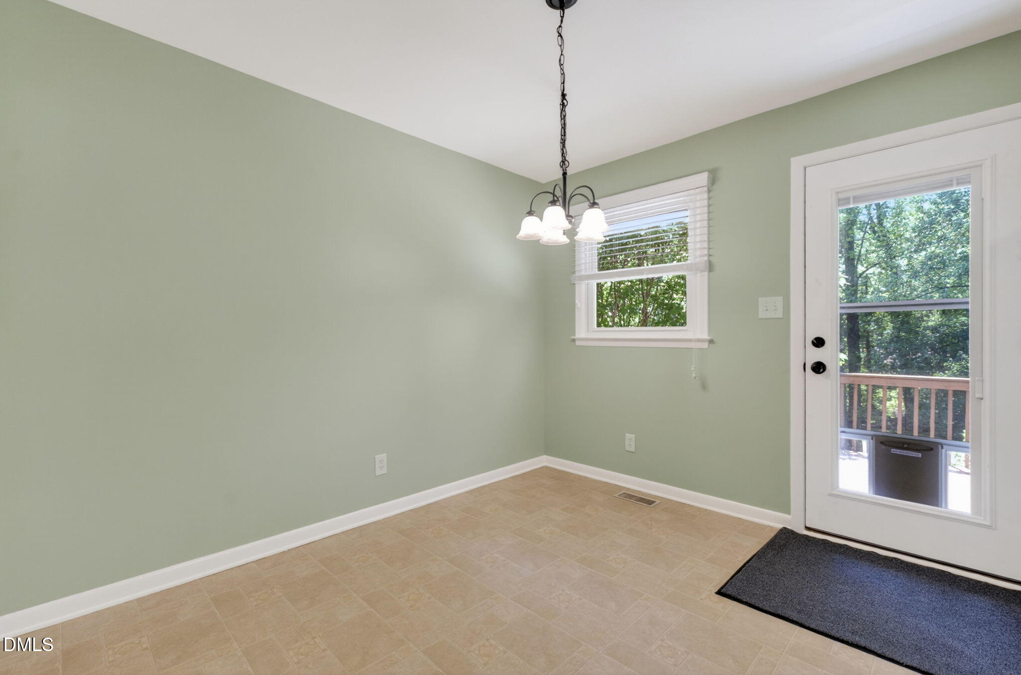 1224 Pineview Drive Raleigh, NC 27606 - Photo 11 of 45 a view of an empty room with a window