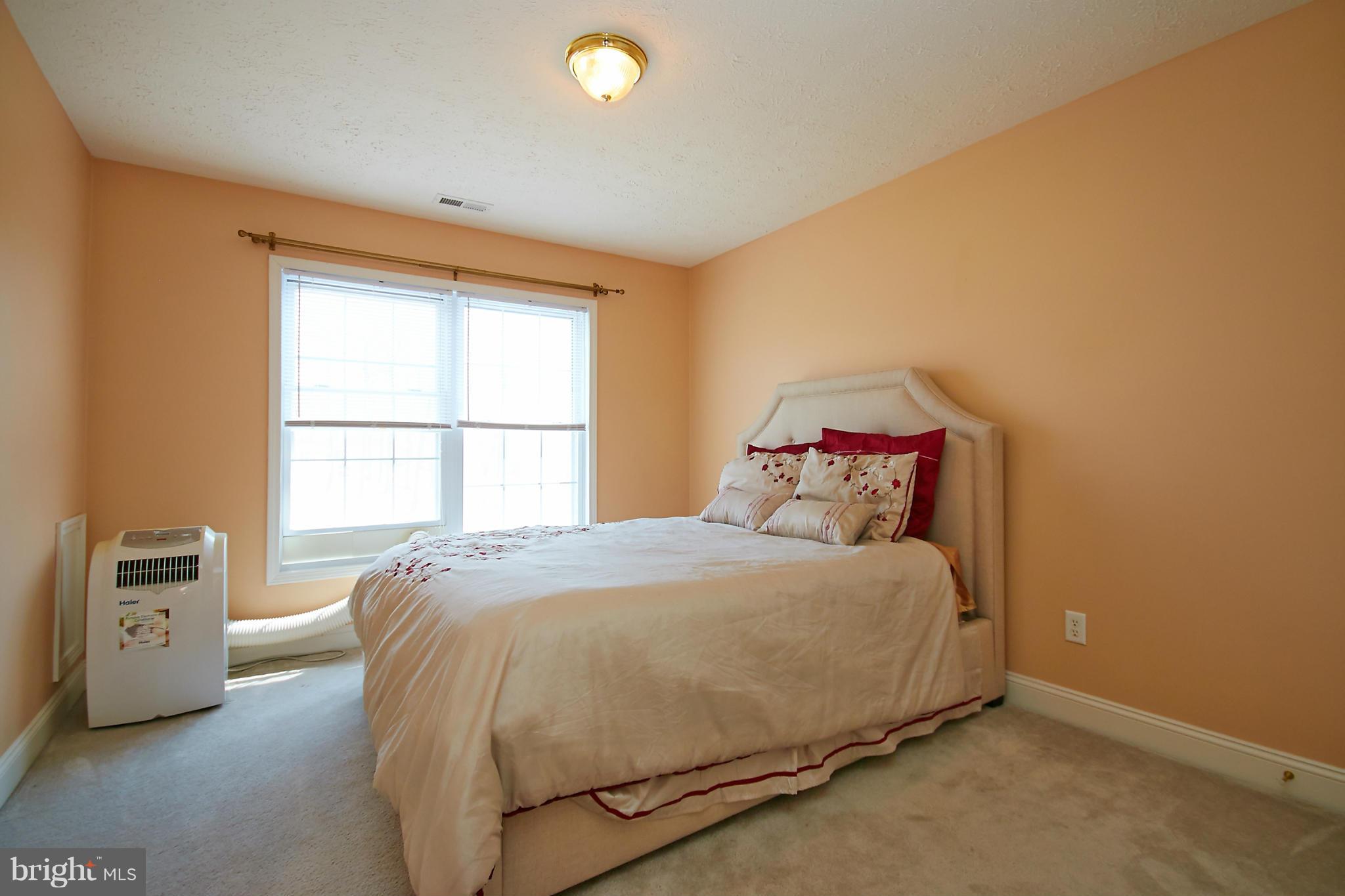 4 Yosemite Ridge Court Stafford, VA 22554 - Photo 19 of 26 a bedroom with a bed and a window