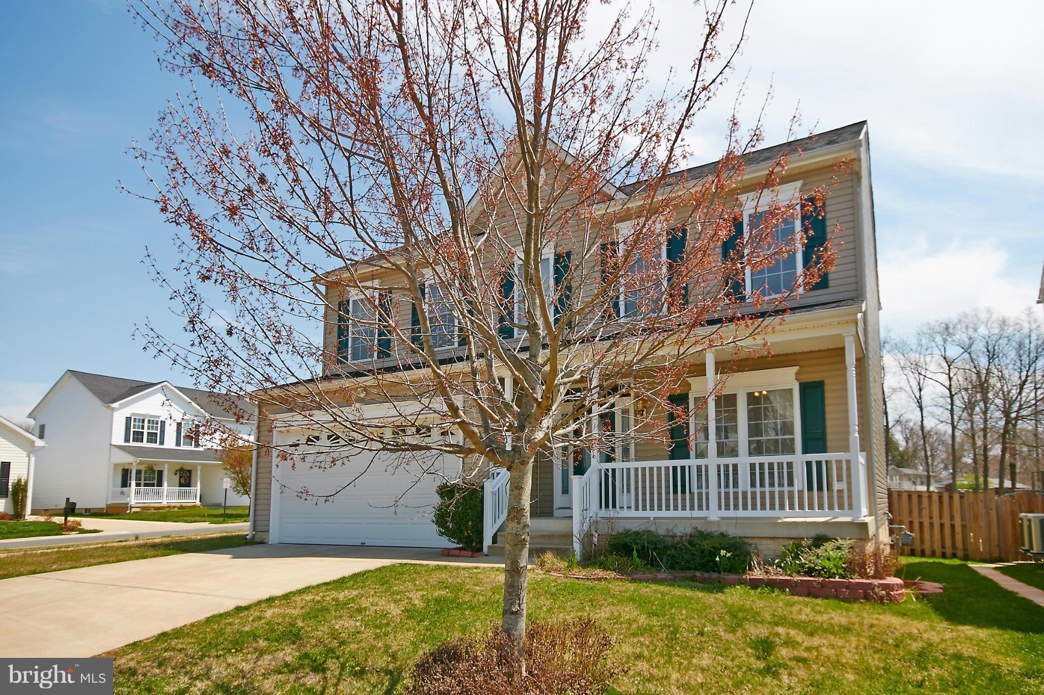 4 Yosemite Ridge Court Stafford, VA 22554 - Photo 3 of 26 a view of a brick building next to a yard