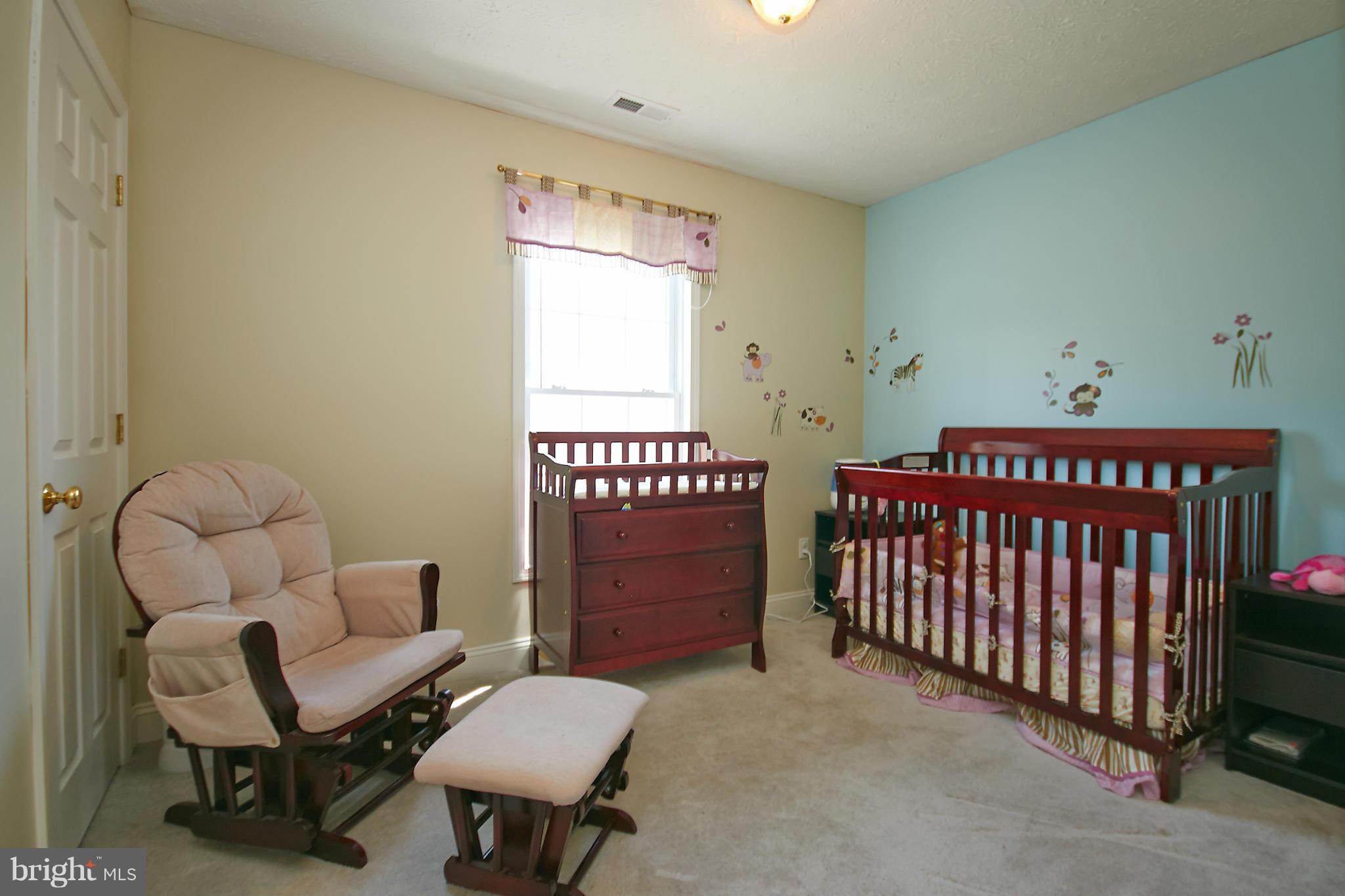 4 Yosemite Ridge Court Stafford, VA 22554 - Photo 21 of 26 a bedroom with furniture and a window