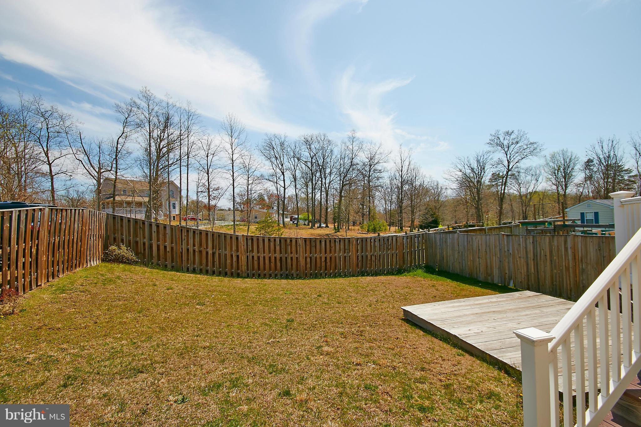 4 Yosemite Ridge Court Stafford, VA 22554 - Photo 26 of 26 a view of swimming pool with trees in front of house