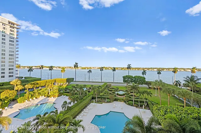 a kitchen with granite countertop a sink and cabinets