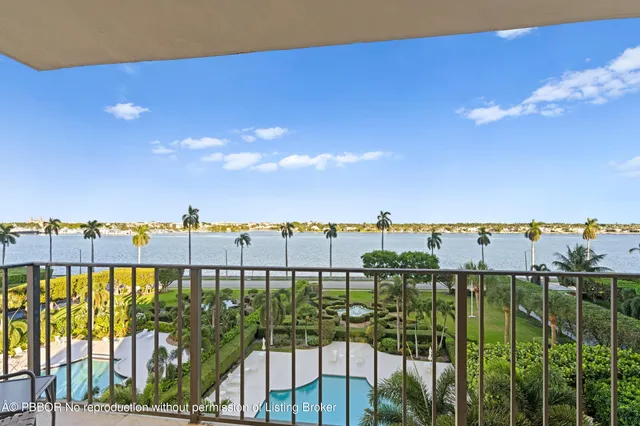 a view of a balcony with wooden floor