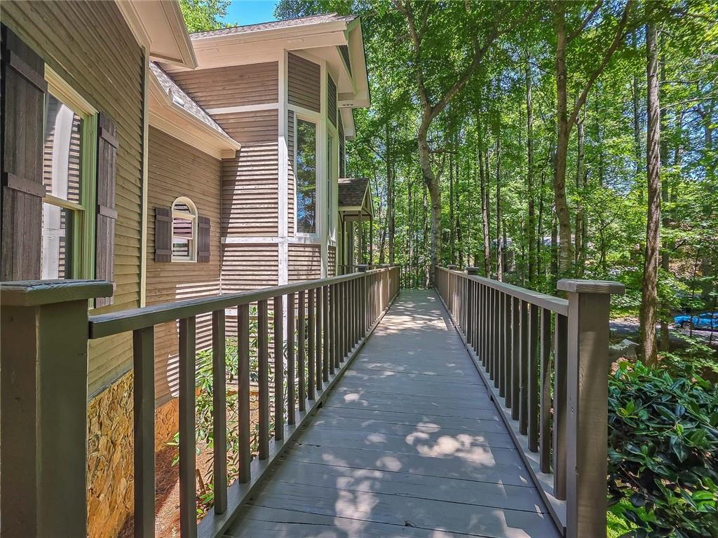 3712 Frederica Road Northwest Berkeley Lake, GA 30096 - Photo 3 of 49 a view of a balcony with wooden floor