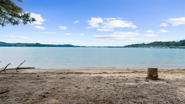 a view of a lake with a beach