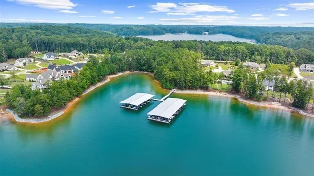 a view of a lake with a yard