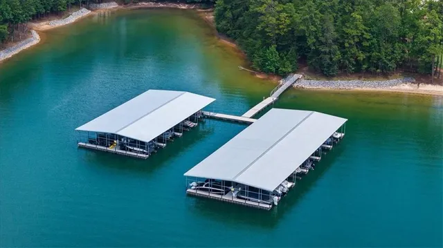 an aerial view of a golf course with chairs