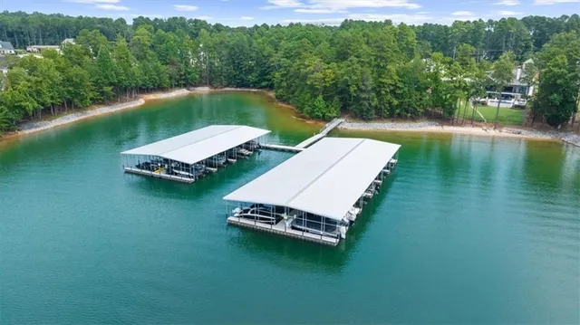 a view of a lake with a yard